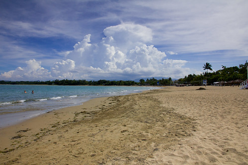 ocean beach clouds palms landscape sand day waves cloudy dominicanrepublic wideangle thunderheads puertaplata