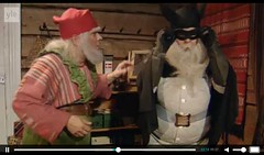 Today's Finnish Christmas Calendar: elf accidentally hits Santa with stepladder, he goes loopy & dresses up as Batman