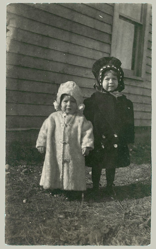 Two children in winter coats