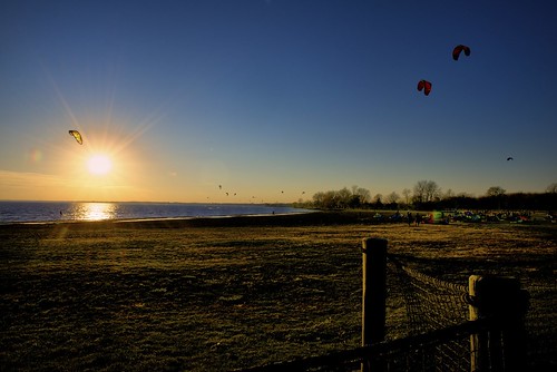 surfing beachgoldenhourlakestclairmetroparkmetrobeachsunsetharrisontownshipmiyellowpinkskite