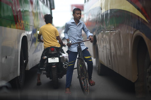 youngman bicycle motorbike bus candid portrait street satkania chittagong bangladesh sooc raw unedited untouched unposed windshield