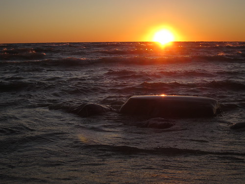 light sunset sun lake water michigan lakemichigan goodhart