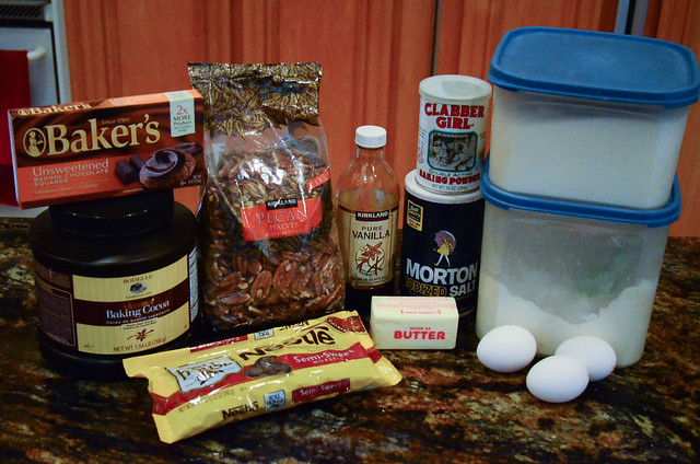 All the required ingredients to make Chocolate Pecan Truffle Cookies.