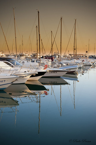 sunset sea italy boats reflex nikon italia tramonto mare barche 50 neptune nettuno d700 50f14g blinkagain paolopenna