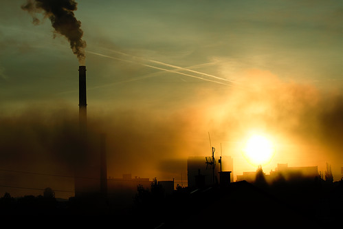 city sunrise industrial pollution