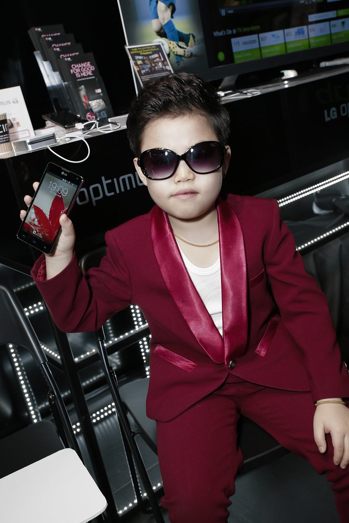 Little Psy with his new LG Optimus G - I am now using the same phone too :) 