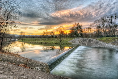 blue trees sunset sky orange green water clouds reflections river colours poland cieszyn weir silesia olza