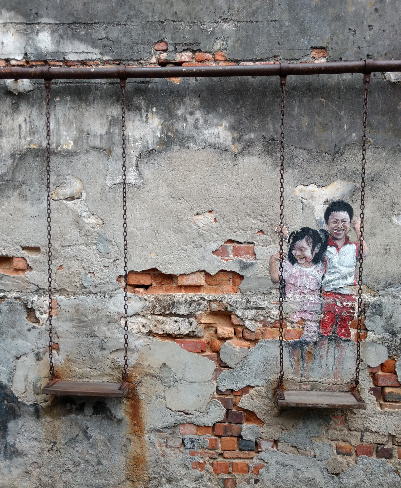 Children on a swing, George Town, Penang