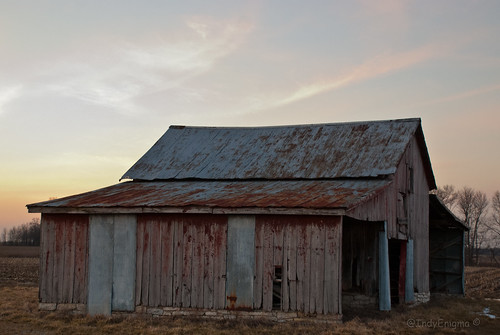 wood old blue red sky clouds barn sunsetlight metalroof