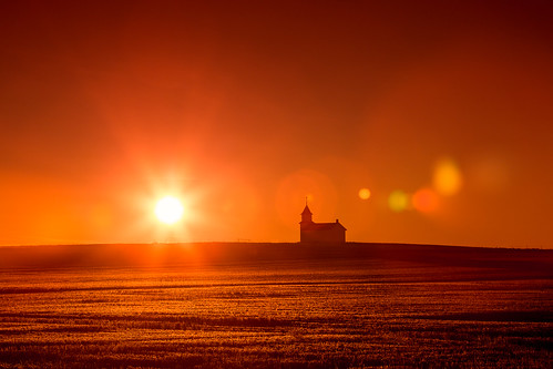 old morning sunset red orange sun sunlight building abandoned church beautiful field silhouette horizontal architecture rural hope worship montana closed day alone loneliness mt cross god farm glory small country prayer religion rustic tranquility chapel nobody grace steeple spire nostalgia silence simplicity lensflare remote backlit christianity prairie spirituality copyspace sunrays desolate dramaticsky idyllic surrounded hilltop dunkirk oldfashioned stubble stockphoto concepts greatplains wheatfield stockphotography royaltyfree smalltownamerica colorimage locallandmark ruralscene rightsmanaged nonurbanscene propertyrelease toolecounty horizonoverland builtstructure bethanylutheranchurch