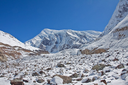 blue nepal sun white snow ice clouds trekking rocks glacier himalaya dhaulagiri chhonbardan depositcamp