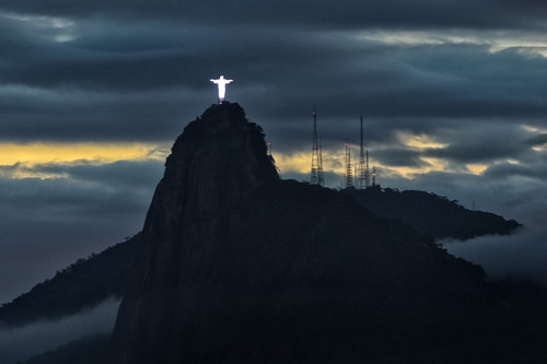 city light sunset brazil sky urban mountain mountains statue riodejaneiro buildings point lights afternoon view nightshot top platform illuminated sugarloaf pãodeaçúcar viewing favela crist redeemer enlightened sugarloafmountain