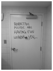 Subversion. Bathroom door. Red Deer.