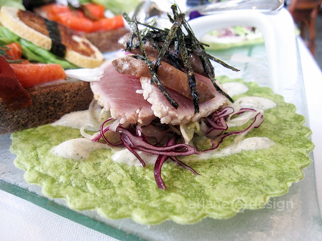 Tuna Tataki served on a spinach tortilla
