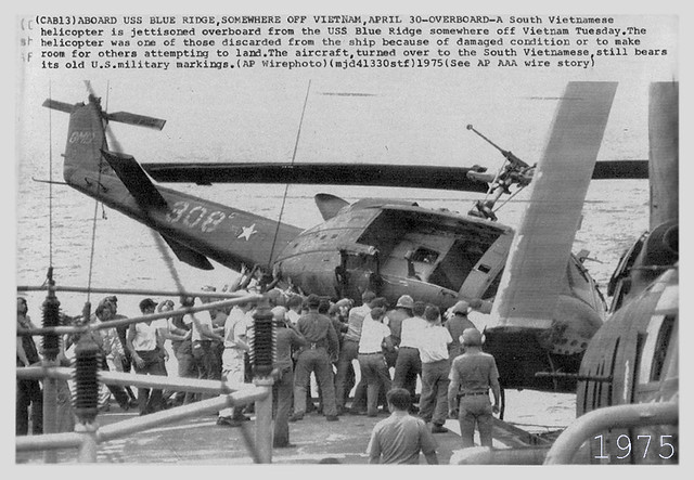 Vietnam War - 1975 Soldier Push Helicopter Off Ship Ocean - Press Photo