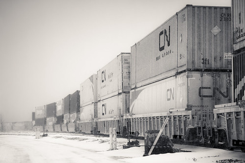 winter snow canada car yard cn train track quebec montreal railway container freight hanjin taschereau canoneos7d 2470lii
