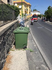 Sidewalk interruption for trash cans @Procida, NA