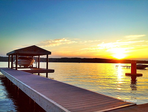 sunset sun lake ny water boat dock dusk over rays photostream canandaigua