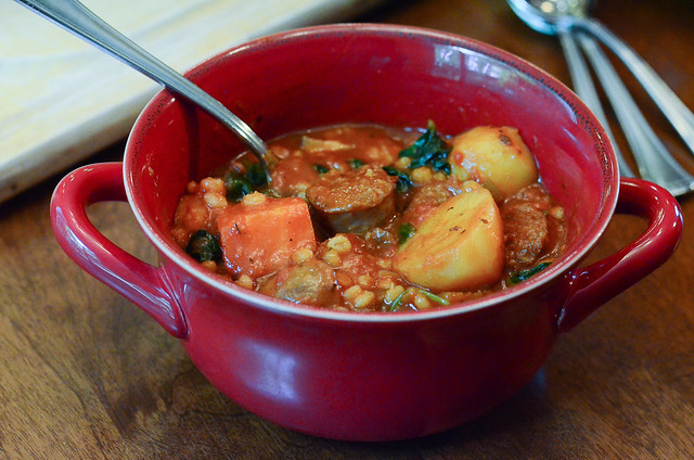 Italian Sausage and Barley Stew served in a bowl.