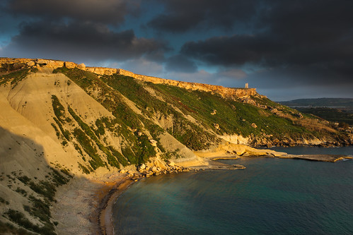 light sunset sea tower bay mediterranean shadows malta cliffs clay limestone tuffieha ghajn gneja