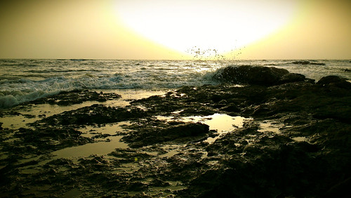 sunset sky seascape beach water sunrise rocks waves splash