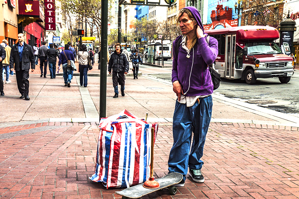Man-with-skateboard-and-plunger--San-Francisco