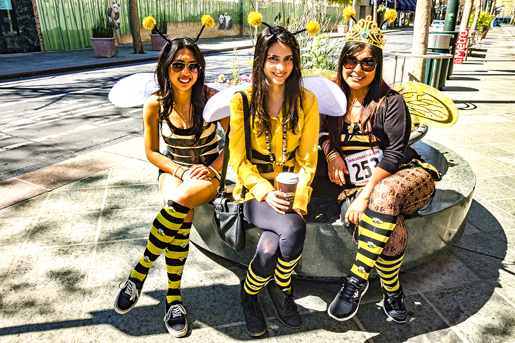 Three-women-dressed-as-bumble-bees--San-Jose