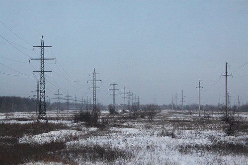 Electrical transmission lines cross the Ukrainian countryside