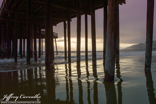 longexposure landscape pier pismo beach pilings sunset cloud clouds colors blue red orange green yellow white black water waves ocean pacific rays light coast central shell surf tide reflection california slo nikon d3200 carvalho