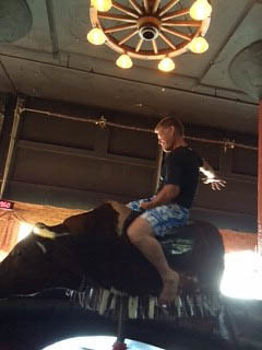 Riding the mechanical bull at the Bourbon Barrel