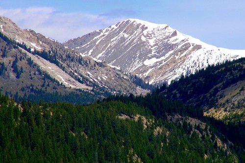 sky snow clouds rockies montana rocks pines rockymountains nationalgeographic ncmountainman phixe