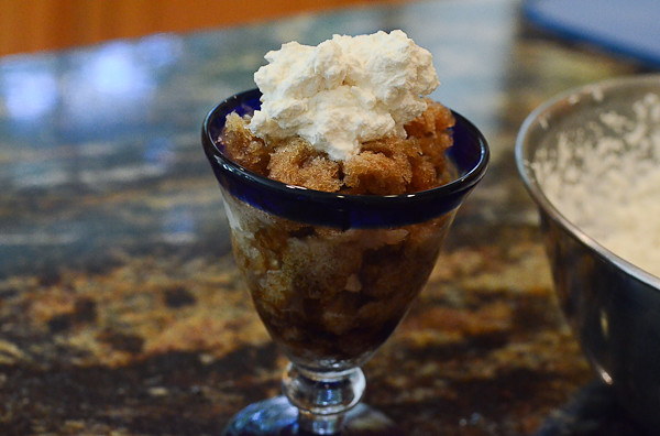Another layer of coffee granita and whipped cream is added.