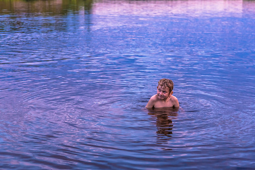 trees boy sunset ontario canada reflection water sudbury coniston lakelaurentain