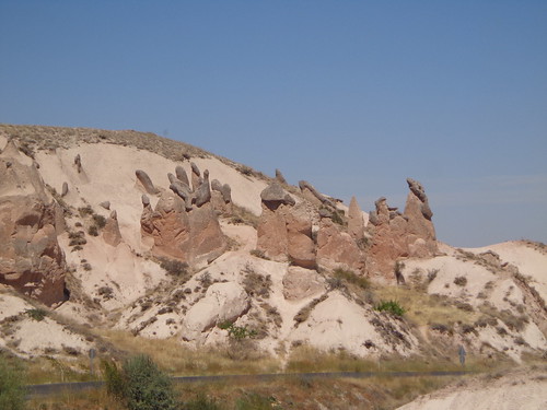Stone structures beside a road in Cappadocia