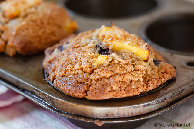 Blueberry peached muffins in the muffin pan