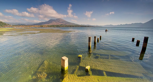 travel sky bali panorama cloud mountain lake fish reflection green nature water grass clouds canon indonesia landscape photography eos volcano fisherman agua scenery colorful asia exposure village waterfront view pano explorer line east explore human filter shore 7d usm tradition activity filters polarizer efs 1022mm interest hitech poeple batur tonal waterscape treking mountainscape colourfull canonefs1022mmf3545usm polarize hikking f3545 baliaga balinesse baliculture canon7d manbutur manbuturphotography