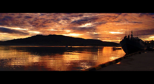 sky reflection ferry clouds sunrise indonesia boat barca nuvole mare alba cielo riflessi sulawesi molo celebes ampana