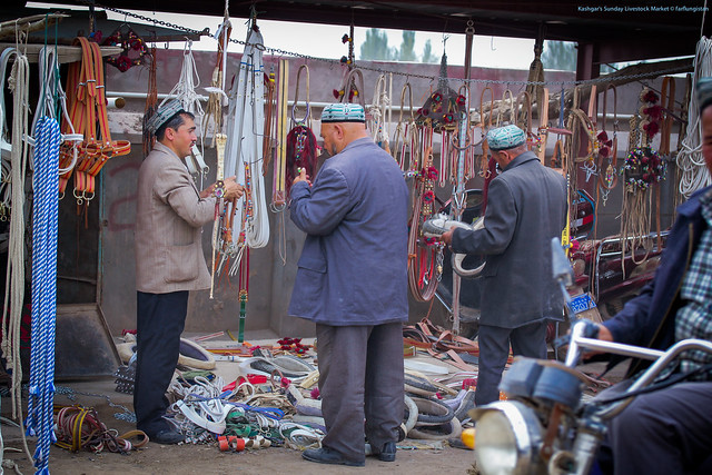 Horse halters and accessories inside the Sunday Livestock Market in Kashgar
