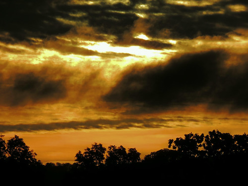 clouds sunrise dark gold dawn