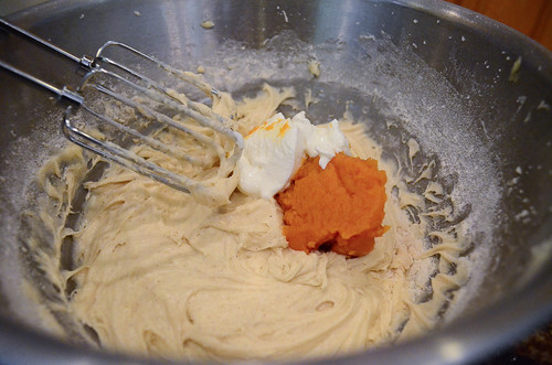 Pumpkin puree and sour cream are added to the mixture.