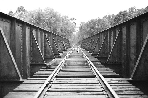 bridge blackandwhite bw usa ny film nature america train 35mm vintage landscape grey industrial pentax k1000 steel traintracks americana blinkagain