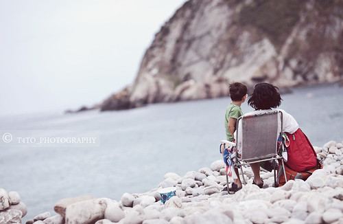 ocean sea summer people sun mountain cold colour love beach water beauty childhood fun spain sand chair rocks dof child view bokeh candid © mother son mum relationship enjoy sound motherhood emotions pure depth pureness feelings canonef135mmf2l canoneos5dmarkii antoniogiudice t4tophotography