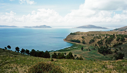 blue lake peru uros urosislands laketiticaca southamerica islands bolivia