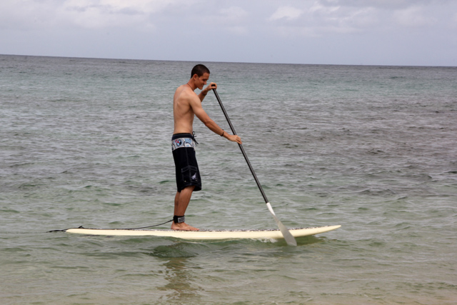 Mark goes stand-up paddleboarding for the first time