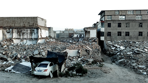 lanzhou gansu china development asia abandoned buildings building wreck car 34c destruction horizontal color hot humid