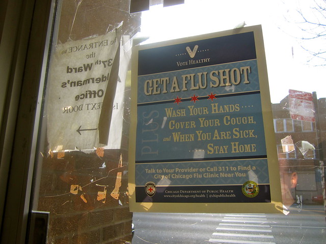 "Get a Flu Shot" Sign on the Door of 37th Ward Alderman Emma Mitts' Ward Office
