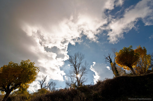 autumn trees sun mountain clouds greece moutain arcadia peloponnisos lykaio anokaryes