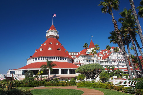 california architecture landscape hotel sandiego flag americanflag bluesky olympus palmtrees coronado polarizer redwhiteblue omd m43 microfourthirds 1250mmf3563mzuiko