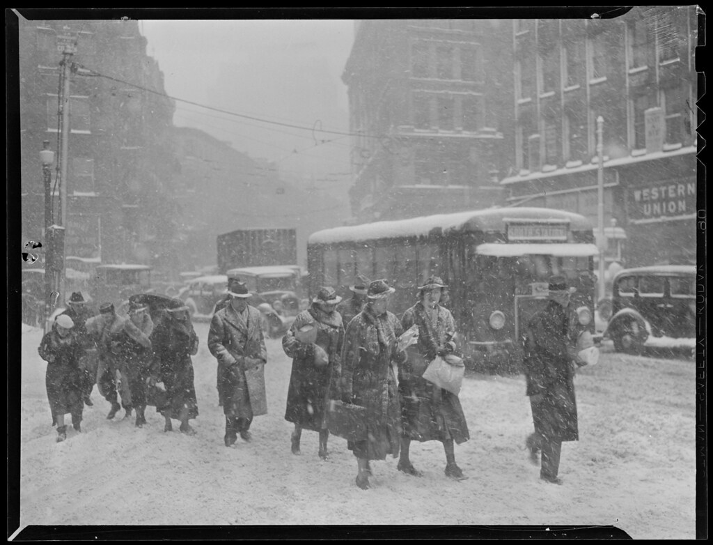 Pedestrians and autos, big snow storm in Boston