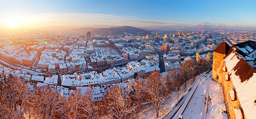 city houses winter panorama snow alps tower castle afternoon view capital slovenia ljubljana late outlook